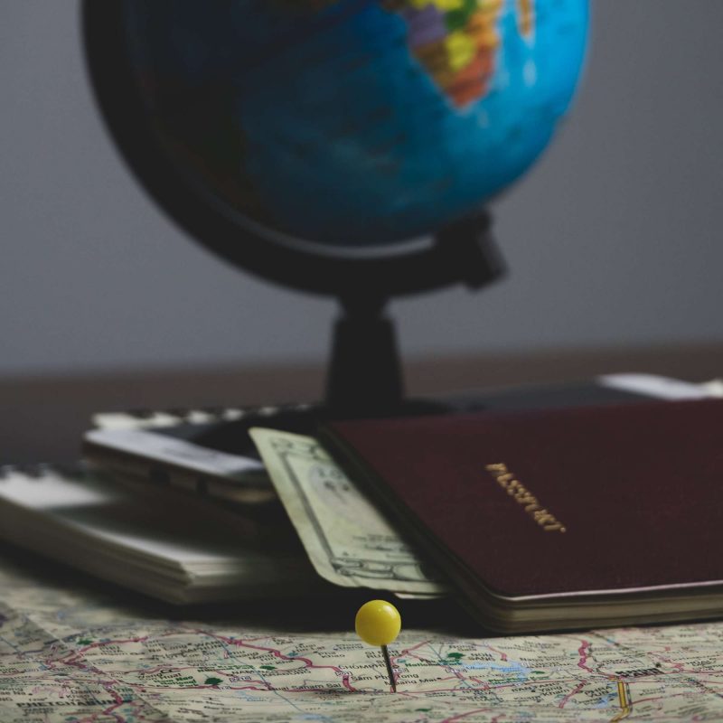 Globe, map and passport